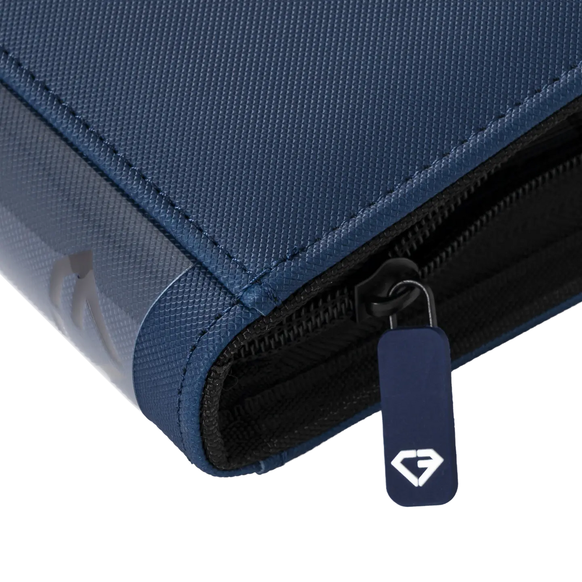 Close-up of the 4-Pocket Card Binder Blue featuring a durable zipper and premium surface finish.