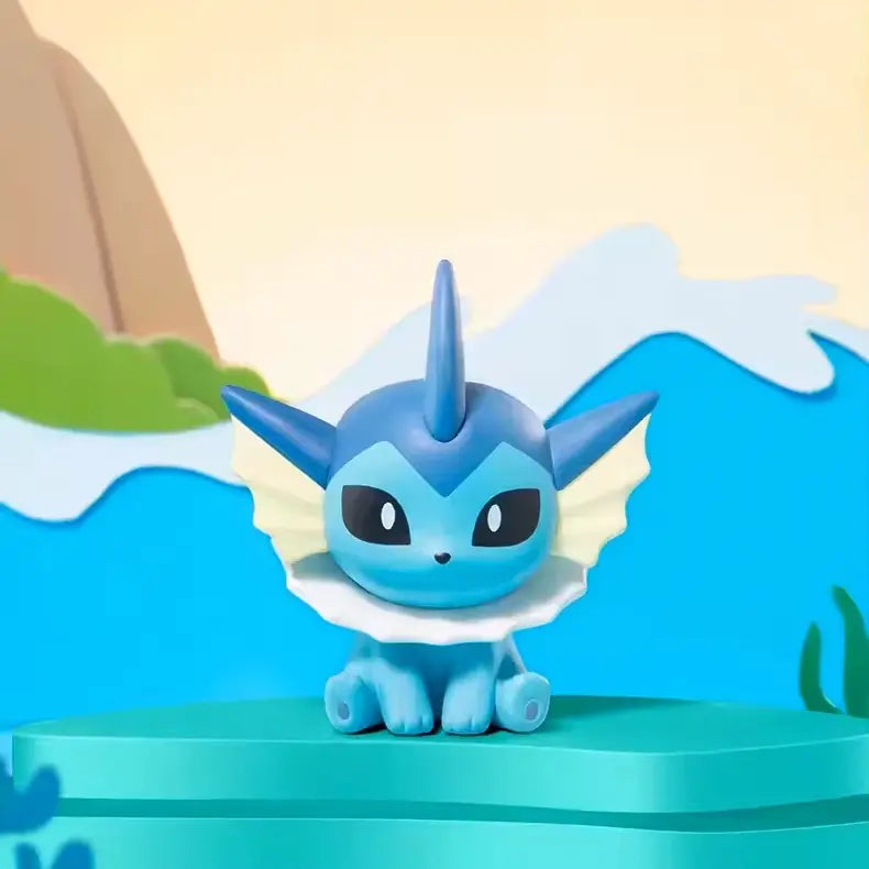 Boîte surprise de mini figurines Pokémon Eeveelution avec figurine Aquali sur fond panoramique.