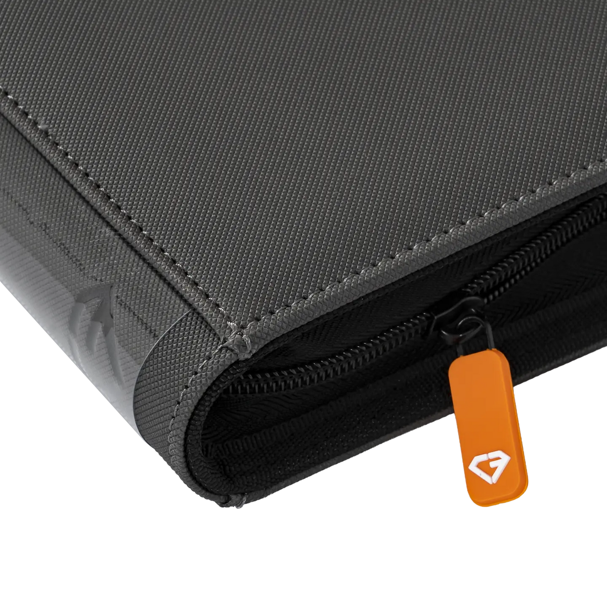 Close-up of the 9 Pocket Card Binder in gray with a smooth zipper and orange pull tab.