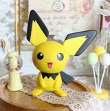 Lovely Pokémon Figure of Pichu, a cute yellow Pokémon with large ears, ideal for fans and collectors.