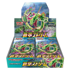 Blue Sky Stream Booster Box display with Rayquaza artwork and Pokémon TCG booster packs.