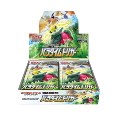 Paradigm Trigger Booster Box featuring booster packs displayed in a retail setting with Pokémon characters.