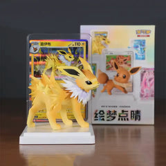 Pokémon Eeveelutions Blind Box [Live] featuring Jolteon figurine and Eevee card in display.