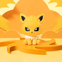 Figurine d'évolution d'Evoli de la boîte mystère mini figurines Eeveelution sur fond jaune vif.