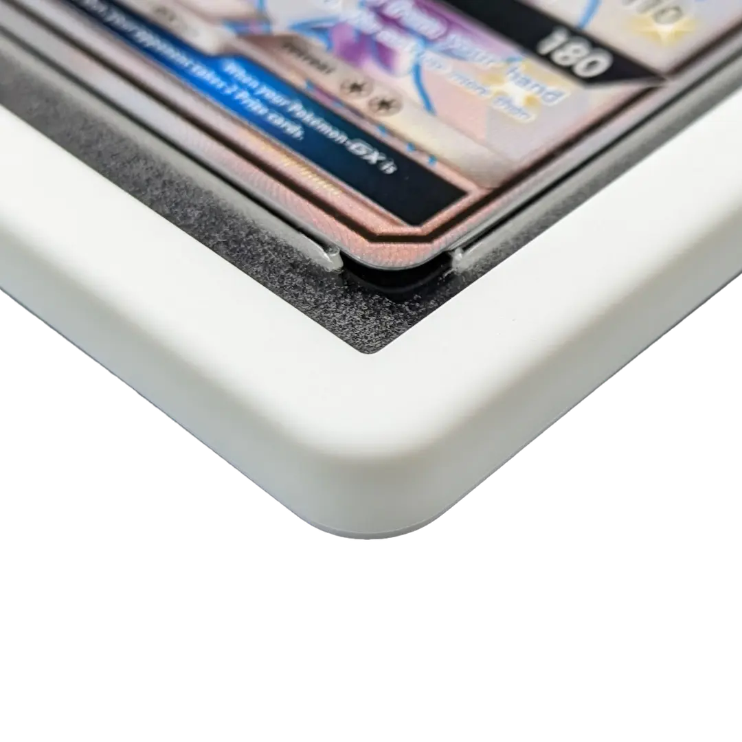 Close-up of PSA Slab Bumper - White showcasing the premium fit for graded card slabs.