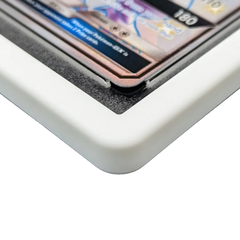 Close-up of PSA Slab Bumper - White showcasing the premium fit for graded card slabs.